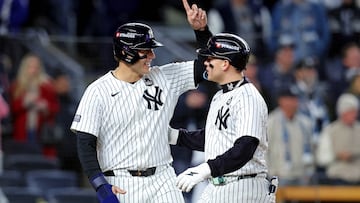 Oct 28, 2024; New York, New York, USA; New York Yankees outfielder Alex Verdugo (24) celebrates with first baseman Anthony Rizzo (48) after hitting a two run home run during the ninth inning against the Los Angeles Dodgers in game three of the 2024 MLB World Series at Yankee Stadium. Mandatory Credit: Brad Penner-Imagn Images