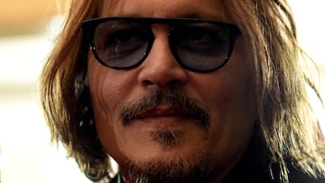 FILE PHOTO: Actor Johnny Depp looks on as he receives the Gold Medal of Merit on the occasion of Serbia's Statehood Day in Belgrade, Serbia, February 15, 2022. REUTERS/Zorana Jevtic/File Photo