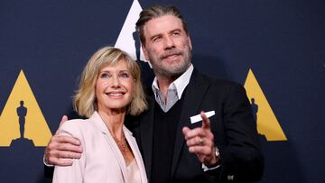 FILE PHOTO: Cast members John Travolta and Olivia Newton-John pose at a 40th anniversary screening of "Grease" at the Academy of Motion Picture Arts and Sciences in Beverly Hills, California, U.S., August 15, 2018. REUTERS/Mario Anzuoni/File Photo