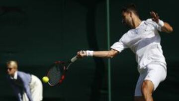 Colombia&#039;s Santiago Giraldo returns against Brazil&#039;s Joao Souza during their men&#039;s singles first round match on day one of the 2015 Wimbledon Championships at The All England Tennis Club in Wimbledon, southwest London, on June 29, 2015.   RESTRICTED TO EDITORIAL USE  -- AFP PHOTO / JUSTIN TALLIS