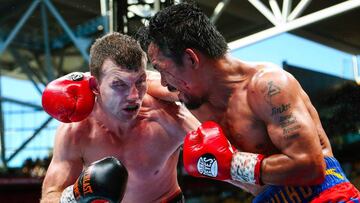 Jeff Horn y Manny Pacquiao pelean durante su combate por el t&iacute;tulo del peso w&eacute;lter de la WBO.