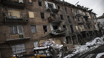 VYSHOROD, UKRAINE - NOVEMBER 30: Debris removal works continue at damaged residential building area due to airstrikes as Russia-Ukraine war continues in Vyshorod, Kyiv Oblast, Ukraine on November 30, 2022. Many people killed and injured as a result of the attacks and residents try to heal their wounds after the attacks. People attempt to rebuild their destroyed homes in the center of Vyshorod, which is 20 kilometers from the capital Kiev, and save their possessions in the neighborhood, which was left as a field of rubble as a result of the attacks. (Photo by Metin Aktas/Anadolu Agency via Getty Images)