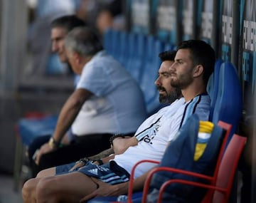 Ezequiel Lavezzi is pictured on the bench before the start of the 2018 FIFA World Cup qualifier football match against Colombia