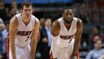 Goran Dragic y Dwyane Wade.