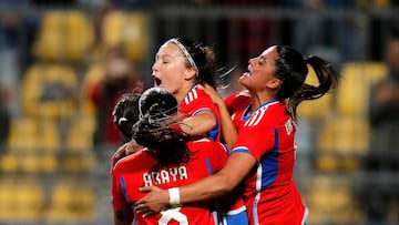 Chile's midfielder Yanara Aedo celebrates with teammates after scoring during the women's team semifinal football match between Chile and United States of the Pan American Games Santiago 2023