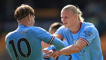 WOLVERHAMPTON, ENGLAND - SEPTEMBER 17: Jack Grealish of Manchester City celebrates with Erling Haaland of Manchester City during the Premier League match between Wolverhampton Wanderers and Manchester City at Molineux on September 17, 2022 in Wolverhampton, United Kingdom. (Photo by Marc Atkins/Getty Images)