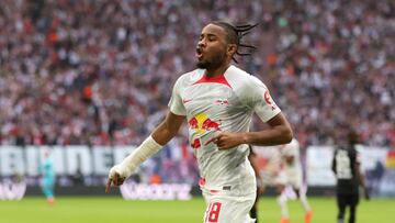 LEIPZIG, GERMANY - OCTOBER 29: Christopher Nkunku of RB Leipzig celebrates after scoring their team's first goal during the Bundesliga match between RB Leipzig and Bayer 04 Leverkusen at Red Bull Arena on October 29, 2022 in Leipzig, Germany. (Photo by Maja Hitij/Getty Images)