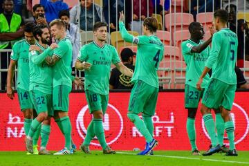 Real Madrid's players celebrate scoring in the Spanish Super Cup semi-final win over Valencia.