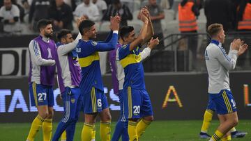 Argentina's Boca Juniors players celebrate at the end of the Copa Libertadores football tournament round of sixteen first leg match against Brazil's Corinthians, at the Corinthians Arena in Sao Paulo, Brazil, on June 28, 2022. (Photo by NELSON ALMEIDA / AFP)