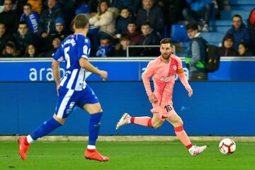 Messi in action against Alavés - his 100th game as Barcelona captain