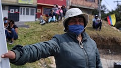 Mujer de escasos recursos en un barrio de Bogotá