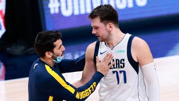 Jan 7, 2021; Denver, Colorado, USA; Denver Nuggets guard Facundo Campazzo (7) greets Dallas Mavericks guard Luka Doncic (77) after the game at Ball Arena. Mandatory Credit: Isaiah J. Downing-USA TODAY Sports