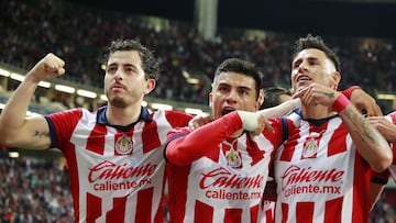   Fernando Beltran celebrates his goal 1-0 with Alan Mozo and Cristian Calderon of Guadalajara  during the Quarterfinals first leg match between Guadalajara and Pumas UNAM as part of Torneo Apertura 2023 Liga BBVA MX, at Akron Stadium, November 30, 2023, in Guadalajara, Jalisco, Mexico.