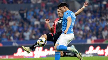 Atlas' Argentine defender #02 Hugo Nervo and Cruz Azul's midfielder #14 Alexis Gutierrez fight for the ball during the Liga MX Apertura tournament football match between Atlas and Cruz Azul at the Jalisco stadium in Guadalajara, Jalisco State, Mexico, on November 6, 2024. (Photo by Ulises Ruiz / AFP)