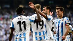Real Sociedad's French forward Mohamed-Ali Cho (L) celebrates with Real Sociedad's Spanish midfielder Brais Mendez after scoring his team's second goal during the Spanish league football match between Real Sociedad and Sevilla FC at the Reale Arena stadium in San Sebastian on June 4, 2023. (Photo by ANDER GILLENEA / AFP)