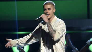 FILE - In this May 22, 2016 file photo, Justin Bieber performs at the Billboard Music Awards in Las Vegas. A Las Vegas man who says Bieber assaulted him in Cleveland eight months ago has filed a police report about the fracas. (Photo by Chris Pizzello/Invision/AP, File)