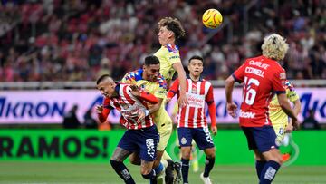 Roberto Alvarado of Guadalajara Sebastian Cacere, Igor Lichnovsky of America  during the 12th round match between Guadalajara and America as part of the Torneo Clausura 2024 Liga BBVA MX at Akron Stadium on March 16, 2024 in Guadalajara, Jalisco, Mexico.