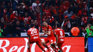 Soccer Football - Liga MX - Semi Final - Second Leg - Toluca v Monterrey - Estadio Nemesio Diez, Toluca, Mexico - December 6, 2025 Toluca's Paulinho celebrates scoring their second goal with teammates REUTERS/Eloisa Sanchez