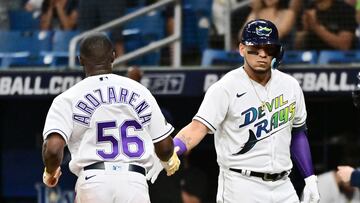 ST PETERSBURG, FLORIDA - SEPTEMBER 22: Randy Arozarena #56 of the Tampa Bay Rays is congratulated by Isaac Paredes #17 after scoring in the first inning against the Toronto Blue Jays at Tropicana Field on September 22, 2023 in St Petersburg, Florida.   Julio Aguilar/Getty Images/AFP (Photo by Julio Aguilar / GETTY IMAGES NORTH AMERICA / Getty Images via AFP)