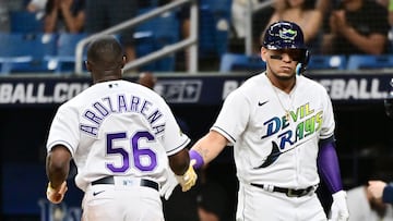 ST PETERSBURG, FLORIDA - SEPTEMBER 22: Randy Arozarena #56 of the Tampa Bay Rays is congratulated by Isaac Paredes #17 after scoring in the first inning against the Toronto Blue Jays at Tropicana Field on September 22, 2023 in St Petersburg, Florida.   Julio Aguilar/Getty Images/AFP (Photo by Julio Aguilar / GETTY IMAGES NORTH AMERICA / Getty Images via AFP)