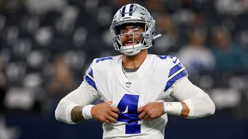 ARLINGTON, TEXAS - DECEMBER 11: Dak Prescott #4 of the Dallas Cowboys warms up prior to a game against the Houston Texans at AT&T Stadium on December 11, 2022 in Arlington, Texas. Tom Pennington/Getty Images/AFP (Photo by TOM PENNINGTON / GETTY IMAGES NORTH AMERICA / Getty Images via AFP)