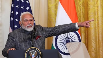 FILE PHOTO: Indian Prime Minister Narendra Modi gestures during a joint press conference with U.S. President Donald Trump at the White House in Washington, D.C., U.S., February 13, 2025. REUTERS/Kevin Lamarque/File Photo