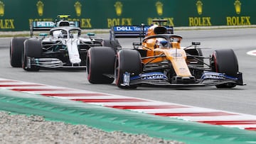Valtteri Bottas (Mercedes W10) y Carlos Sainz (McLaren MCL34). Barcelona, F1 2019. 
