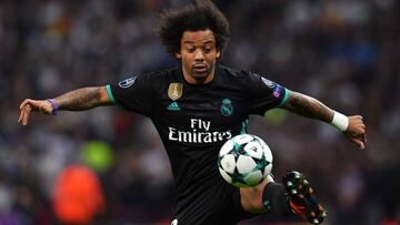 Real Madrid's Brazilian defender Marcelo controls the ball during the UEFA Champions League Group H football match between Tottenham Hotspur and Real Madrid at Wembley Stadium in London, on November 1, 2017. / AFP PHOTO / Ben STANSALL