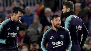 Busquet, Messi y Piqué.