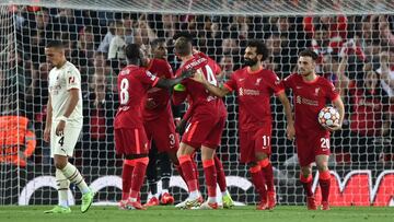 LIVERPOOL, ENGLAND - SEPTEMBER 15: Mohamed Salah of Liverpool celebrates with teammates after scoring their side's second goal during the UEFA Champions League group B match between Liverpool FC and AC Milan at Anfield on September 15, 2021 in Liverp