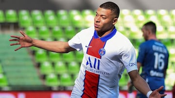 Paris Saint-Germain&#039;s French forward Kylian Mbappe celebrates after scoring a goal during the French L1 football match between Metz (FC Metz) and Paris Saint-Germain (PSG) at the Saint Symphorien stadium in Longeville-l&egrave;s-Metz, on April 24, 20