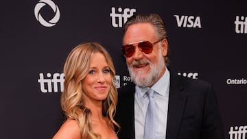Cast member Russell Crowe and Britney Theriot pose during the red carpet for the film "Nuremberg" as the Toronto International Film Festival (TIFF) returns for its 50th edition in Toronto, Ontario, Canada, September 7, 2025. REUTERS/Mark Blinch