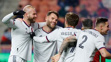 Mar 25, 2023; Sandy, Utah, USA; St. Louis City forward Klauss (9),  midfielder Eduard Lowen (10) celebrate with midfielder Indiana Vassilev (19) after a second half goal at America First Field. Mandatory Credit: Jeffrey Swinger-USA TODAY Sports