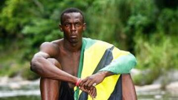 <b>THE NATURAL. </b>Usain Bolt, envuelto en la bandera de Jamaica, posó para AS en la espesura selvática de su hábitat natural: la jungla de Trelawny, cerca de Kingston.