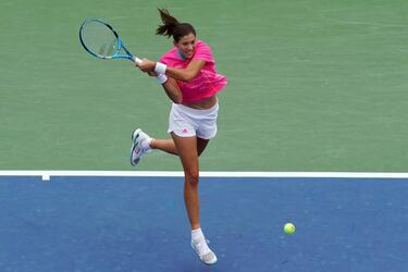 Rain halts Halep as Muguruza's defence ends and Wozniacki retires