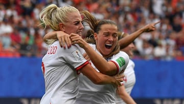 England's defender Alex Greenwood (L) is congratulated by teammates after scoring a goal during the France 2019 Women's World Cup round of sixteen football match between England and Cameroon, on June 23, 2019, at the Hainaut stadium in Valencien