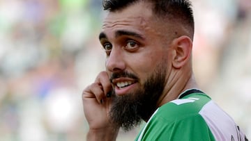 (FILES) Real Betis' Spanish forward Borja Iglesias celebrates scoring his team's first goal during the Spanish League football match between Real Betis and Girona FC at the Benito Villamarin stadium in Seville on September 18, 2022. Spanish striker Borja Iglesias quit the men's national team on August 25, 2023 after federation president Luis Rubiales refused to resign following his unsolicited kiss on Women's World Cup star Jenni Hermoso's lips. The Real Betis forward, who has played twice for his country, most recently in March, took a stand against the Spanish football federation (RFEF) chief's decision to fight for his job. (Photo by CRISTINA QUICLER / AFP)