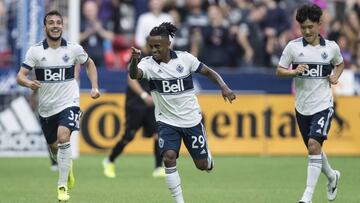 Vancouver Whitecaps&#039; Yordy Reyna, center, Russell Teibert, left, and Inbeom Hwang celebrate Reyna&#039;s goal against D.C. United during the first half of an MLS soccer match Saturday, Aug. 17, 2019, in Vancouver, British Columbia. (Darryl Dyck/The C