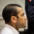 (FILES) Brazilian footballer Dani Alves looks on at the start of his trial at the High Court of Justice of Catalonia in Barcelona, on February 5, 2024. Convicted of rape, ex-Brazil star Dani Alves will be freed on bail for 1 mn euros, the court has ruled on March 20, 2024. Ex-Brazil star has been sentenced to 4.5 years in jail for rape on February 22, 2024. (Photo by Jordi BORRAS / POOL / AFP)
