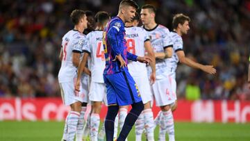 BARCELONA, SPAIN - SEPTEMBER 14: Gerard Pique of Barcelona reacts after conceding their side&#039;s first goal scored by Thomas Muller of Bayern Munich during the UEFA Champions League group E match between FC Barcelona and Bayern Muenchen at Camp Nou on 