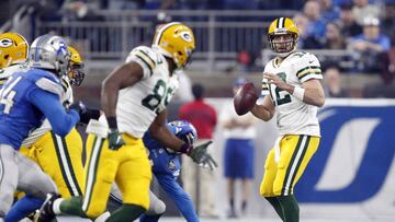 Jan 1, 2017; Detroit, MI, USA; Green Bay Packers quarterback Aaron Rodgers (12) looks for an open man against the Detroit Lions during the first quarter at Ford Field. Mandatory Credit: Raj Mehta-USA TODAY Sports