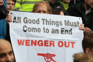 Arsene Wenger signs after the English Premier League football match between West Bromwich Albion and Arsenal