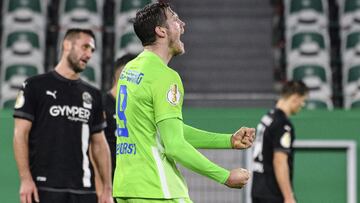 Wolfsburg&#039;s Wout Weghorst celebrates after scoring the 4-0 goal, during the German Cup 2nd round soccer match between VfL Wolfsburg and SV Sandhausen at Volkswagen Arena, in Wolfsburg, Germany, Wednesday, Dec. 23, 2020. (Swen Pf&#039;rtner/dpa via AP