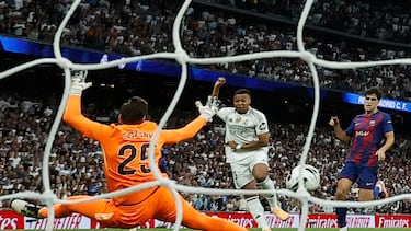 Real Madrid's French forward #10 Kylian Mbappe scores a goal, eventually disallowed, during the Spanish league football match between Real Madrid CF and FC Barcelona at Santiago Bernabeu Stadium in Madrid on October 26 , 2025. (Photo by Oscar DEL POZO / AFP)