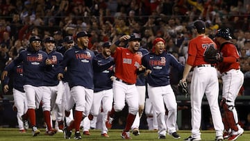 BOSTON, MASSACHUSETTS - OCTOBER 05: The Boston Red Sox run to Garrett Whitlock #72 as they celebrate their 6-2 win against the New York Yankees in the American League Wild Card game at Fenway Park on October 05, 2021 in Boston, Massachusetts. Winslow To