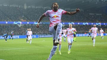 BRUGGE, BELGIUM - NOVEMBER 24: Christopher Nkunku of RB Leipzig celebrates after scoring their side&#039;s first goal during the UEFA Champions League group A match between Club Brugge KV and RB Leipzig at Jan Breydel Stadium on November 24, 2021 in Brugg