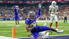 Dec 29, 2022; San Antonio, Texas, USA; Washington Huskies wide receiver Taj Davis (3) runs for a touchdown in the second half against the Texas Longhorns in the 2022 Alamo Bowl at the Alamodome. Mandatory Credit: Daniel Dunn-USA TODAY Sports