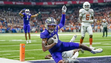 Dec 29, 2022; San Antonio, Texas, USA; Washington Huskies wide receiver Taj Davis (3) runs for a touchdown in the second half against the Texas Longhorns in the 2022 Alamo Bowl at the Alamodome. Mandatory Credit: Daniel Dunn-USA TODAY Sports