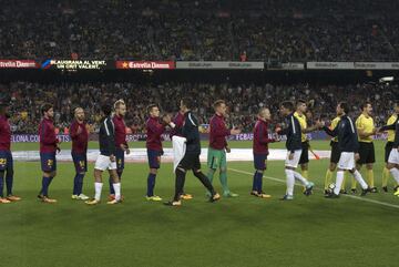 Both teams greet each other.