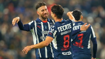 Monterrey's Spanish midfielder #08 Oliver Torres celebrates with teammate Spanish defender #93 Sergio Ramos after scoring during the Liga MX Clausura football match between Monterrey and San Luis at the BBVA stadium in Guadalupe, Nuevo Leon state, M�xico on February 22, 2025. (Photo by Julio Cesar AGUILAR / AFP)